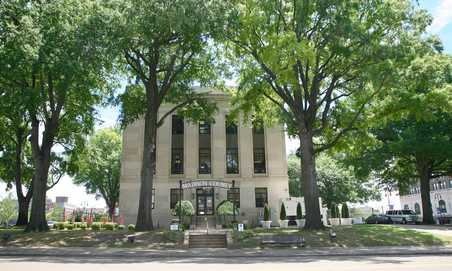 A view of the Madison County courthouse building surrounded by the walkway