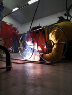 Boy Scout welding Metal