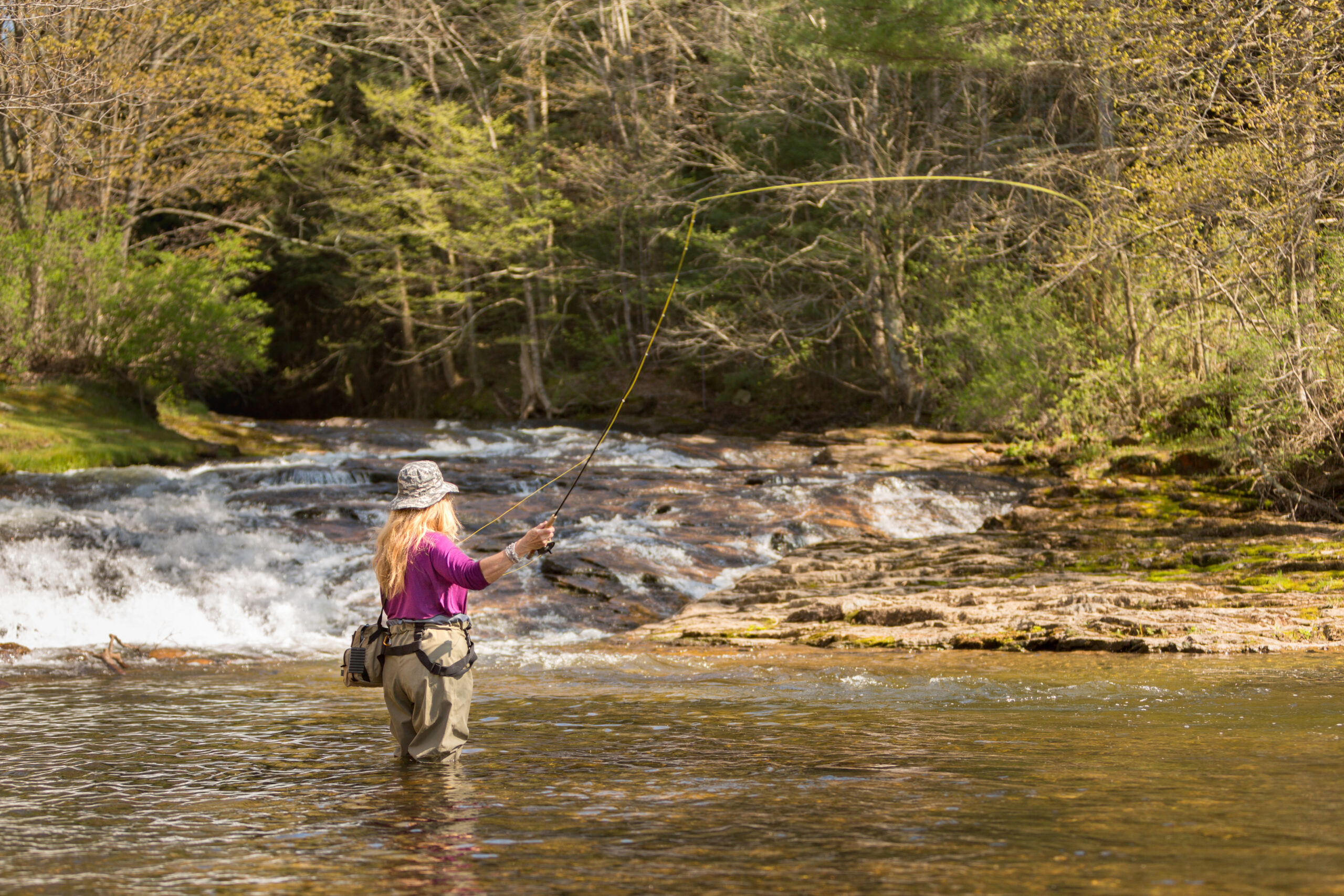 A person fly fishing
